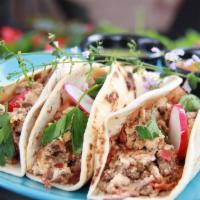 Machaca and Eggs Tacos  · 3 pieces. Traditional shredded beef and pig beans with flower tortilla.