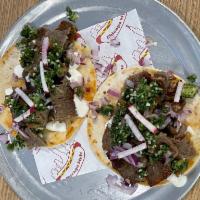 Gyro Tacos (three) · Shaved gyro meat with house seasoning, onion, radish, cucumber lebneh, whipped feta, jalapeñ...