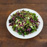 Kale Salad · Mix of green and purple kale, red cabbage, candied pecans, and cranberries with poppy seed v...