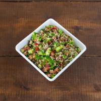 Quinoa Mediterranean Salad · Quinoa, chopped tomato, cucumber, olives, chickpeas and parsley with lime vinaigrette.