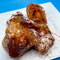 Peach Cobbler Eggroll  · Aunt Bert's Traditional Peach Cobbler Filling deep-fried in an eggroll wrapper, dusted with ...