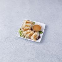 Gyoza · Pan-fried dumpling with your choice of filling.