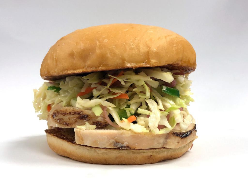 The Coup Signature Grilled Chicken Sandwich · Organic air-chilled grilled chicken breast with organic spicy veggies on a toasted organic artisan bun.