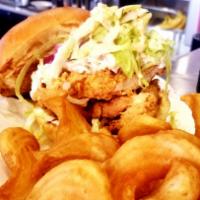 Crispy Chicken Sandwich · Lettuce, red onion and spicy mayo. Served with french fries