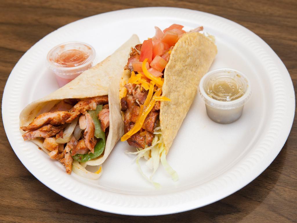 20. Chicken Taco · Grilled chicken. Fried corn tortilla or soft flour tortilla topped with cheddar cheese and served with iceberg lettuce and tomato.