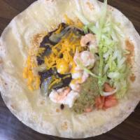60a. Shrimp Burrito · Served in a large fresh tortilla with rice, black beans, cheddar cheese, onions, guacamole, ...