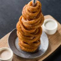 Onion Ring Tower · Beer-battered, parmesan, chipotle ranch, buttermilk ranch. Vegetarian.