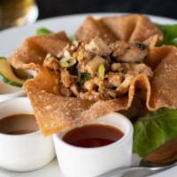 Chicken Lettuce Wraps · Tofu, green onions, water chestnuts, wonton cup, pickled vegetables, sweet chili, spicy pean...