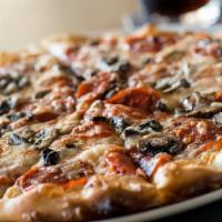 Pepperoni & Mushroom Pizza · Crimini mushrooms, mozzarella, tomato sauce.