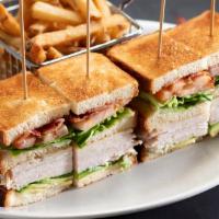 Stacked Turkey Club · Roasted turkey, bacon, swiss, avocado, tomato, boston lettuce, mayo, toasted brioche