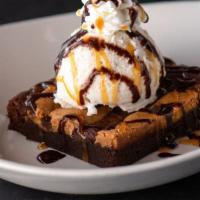 Brookie · Cookie dough fudge brownie, chocolate & caramel sauces, vanilla ice cream