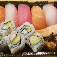Sushi Deluxe · 9 pieces sushi and 1 California roll