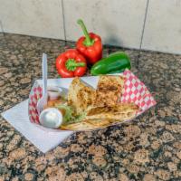 Hawaiian Quesadilla · Grande flour tortilla stuffed with grilled marinated chicken, cooked with fresh bell pepper,...