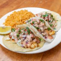Fish Tacos · 3 corn tortillas, grilled fish fillets , coleslaw, pico de gallo, tangy house sauce. Served ...