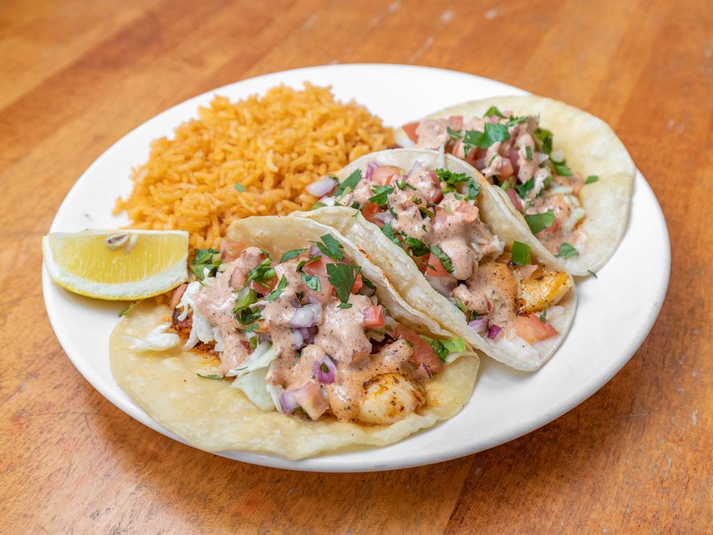 Fish Tacos · 3 corn tortillas, grilled fish fillets , coleslaw, pico de gallo, tangy house sauce. Served with house made Spanish rice.