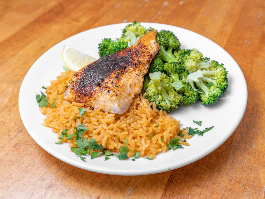 Icehouse Grilled Blackened Salmon  · Blackened salmon served with housemade spanish rice and grilled seasonal vegetables..