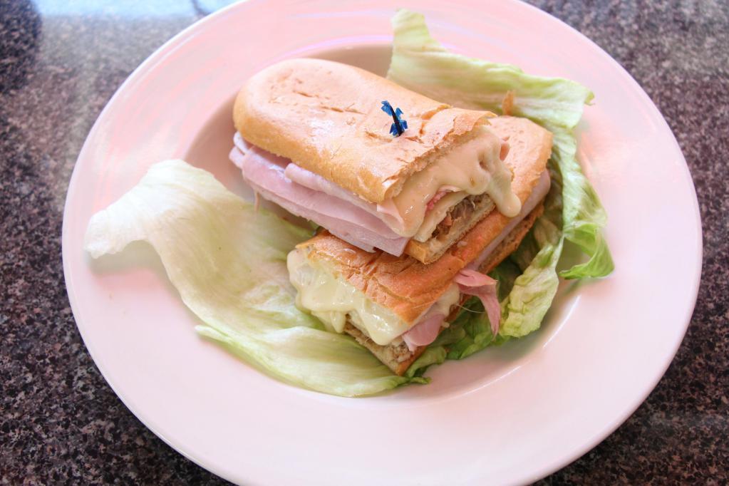 Cuban Sandwich · Pork, ham, Swiss cheese and pickles.