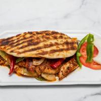 Chicken Fajita Panini · Grilled chicken, cheddar cheese, roasted peppers, and onion.