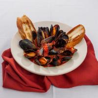 Mussels Rosso · Mussels sauteed in your choice of marinara sauce, served over linguine. Served with choice o...