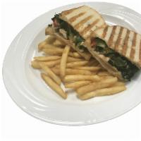 Fratelli's Panini · Grilled chicken breast, spinach, red roasted peppers, fresh mozzarella, balsamic reduction a...