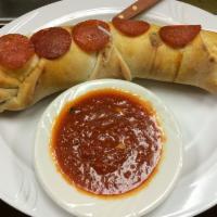Stromboli · With pepperoni, sausage and mozzarella and sauce on the side.
