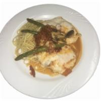 Chicken Maximo · Chicken breast sautéed with mushrooms, asparagus and sundried tomatoes
in a sherry wine sauc...