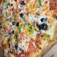 Veggie Pizza · Mushrooms, onions, green peppers, banana peppers, olives, tomatoes, fresh garlic.