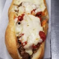 Pizza Steak Sandwich · 1/2 lb. of 100% sirloin beef served on a footlong roll. Available with sauteed onions upon r...