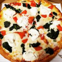 Mediterranean Pizza · Tomatoes, spinach and ricotta cheese.