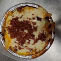 Mega Fries · Crispy fries smothered with cheddar and mozzarella cheese and topped with bacon bits and sea...