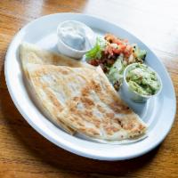 Quesadilla · Grilled flour tortillas with mixed cheese.  Side of pico de gallo and sour cream.