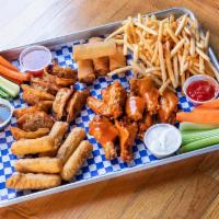 Sampler Platter · Egg rolls, mozzarella sticks, pot stickers, wings with choice of sauce, fries and veggies.