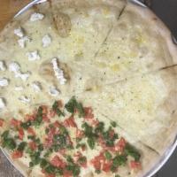 White Primavera Pizza · Broccoli, tomatoes, ricotta and fresh garlic.