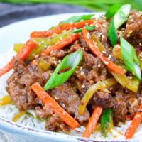 S16. Szechaun Beef · The slices beef sautéed with garden vegetables in Szechuan style. Choice of rice. Hot and sp...