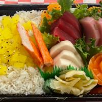 Chirashi · Raw. 12 pieces sashimi over rice.