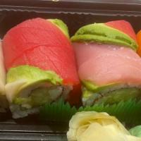 Rainbow Roll · Raw. Cucumber, avocado, crabmeat, and topped with raw fish.

