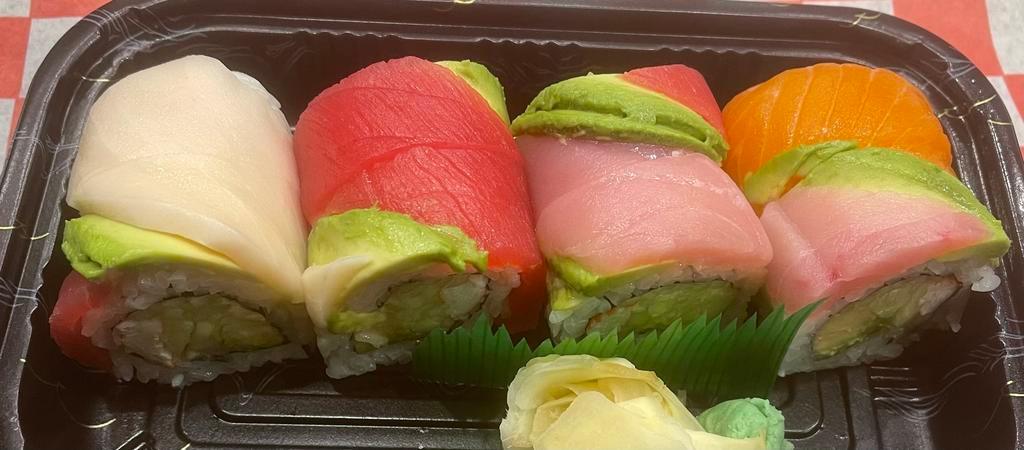 Rainbow Roll · Raw. Cucumber, avocado, crabmeat, and topped with raw fish.
