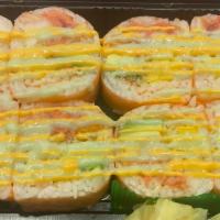 Happy Roll · Raw and spicy. Spicy tuna, spicy salmon, white tuna, crunch, avocado, and mango. Wrapped wit...
