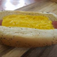 Jumbo Cheese Dog · Jumbo Hot Dog with Cheddar Cheese Sauce on Poppy Seed Bun.  Your Choice of Hot Dog Toppings.