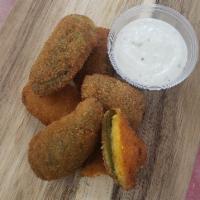 Poppers - Cheddar  · Six Jalapeno Poppers with Cheddar Cheese Filling. Your Choice of Sauce.