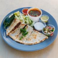 Quesadilla · A large quesadilla. The meat of your choosing, melted mozzarella cheese. The quesadilla come...