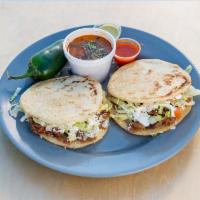 Gordita · 2 gorditas include bean, meat, lettuce, tomatoes, sour cream, and Mexican cheese. Includes f...