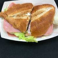 Torta el Chavo  · Toasted bread, mayonnaise, ham, queso fresco, lettuce, tomato, onion, and jalapenos on side.