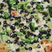 Veggie Specialty Pizza · Green peppers, onion, mushrooms, and broccoli.