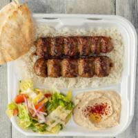 Beef Luleh Kabob Plate · Spice-infused ground beef that is charbroiled. Served with rice pilaf, fresh garden salad, s...