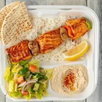 Salmon Kabob Plate · Alaskan salmon marinated to perfection, skewered, and charbroiled with mushroom, onion, and ...