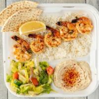 Shrimp Kabob Plate · Beautifully-marinated jumbo shrimp that have been skewered and charbroiled. Served with fluf...