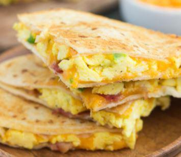 TRAP'N SAUSAGE,BACON &CHEESE · ENJOY OUR HOOD SIGNATURE SAUSAGE,BACON QUESADILLA W/ EGGS AND  YO CHOICE OF TOPPINGS!