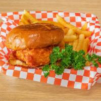 Chicken sandwich combo  · 100% hand breaded premium chicken breast fried to perfection signature sauce pickles  on a t...