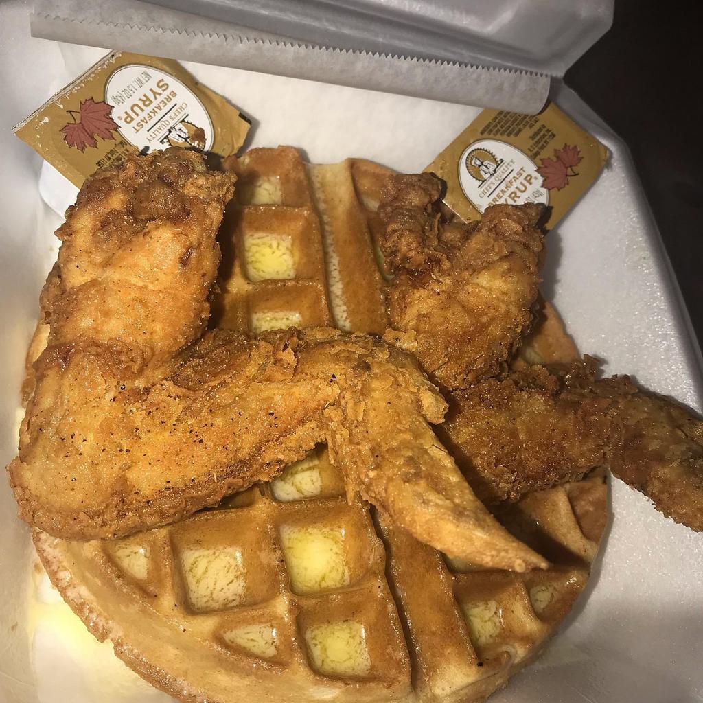 Chicken and Waffles · Huge size butter infused waffle and 2 well seasoned Jumbo Whole Wings or 3 Crispy Tenders

Make it a combo - add drink for $1.50